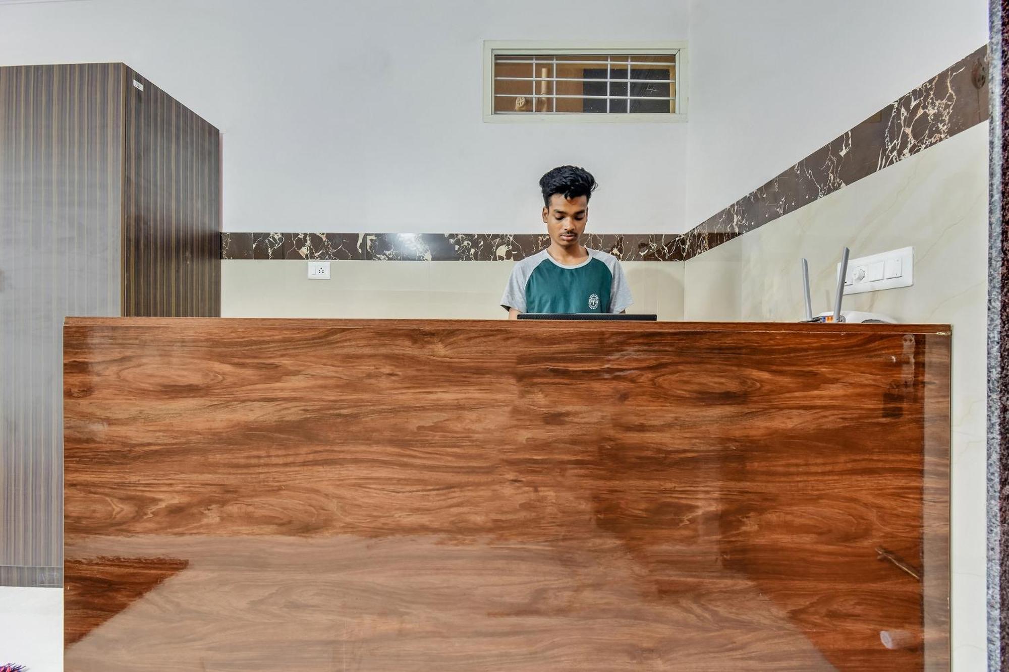 Hotel O Sri Sai Guru Comforts Yelahanka Bagian luar foto