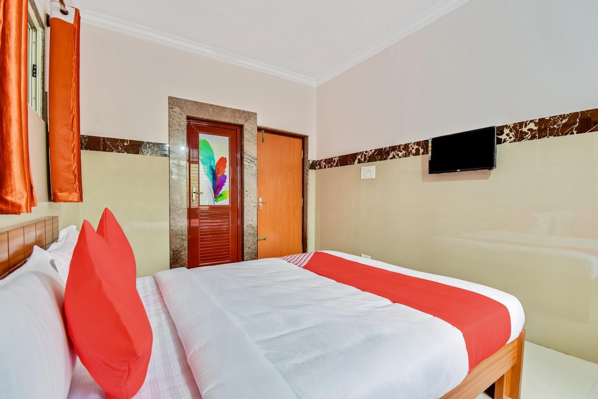 Hotel O Sri Sai Guru Comforts Yelahanka Bagian luar foto