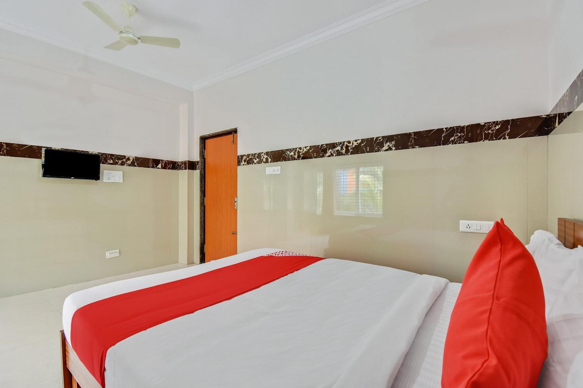 Hotel O Sri Sai Guru Comforts Yelahanka Bagian luar foto
